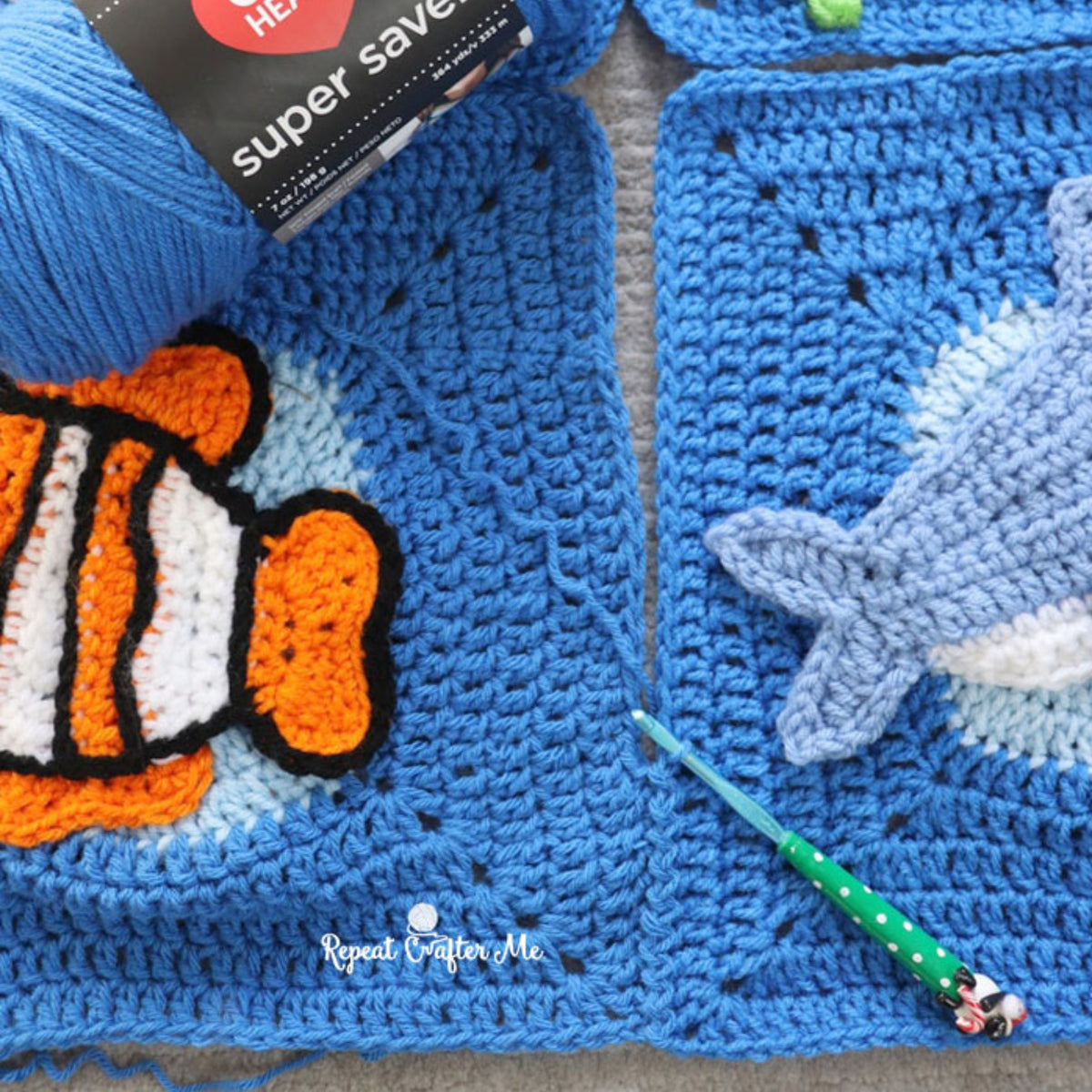Under The Sea Crochet Blanket made using Red Heart yarn in a styled lifestyle setting