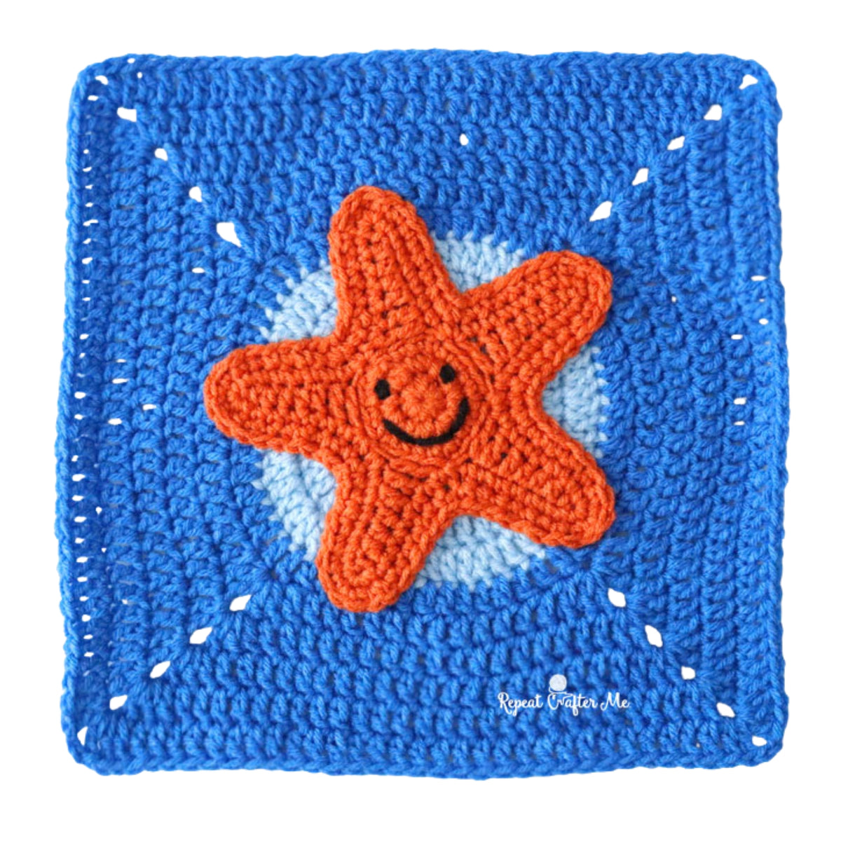Under The Sea Crochet Blanket made using Red Heart yarn in a styled lifestyle setting