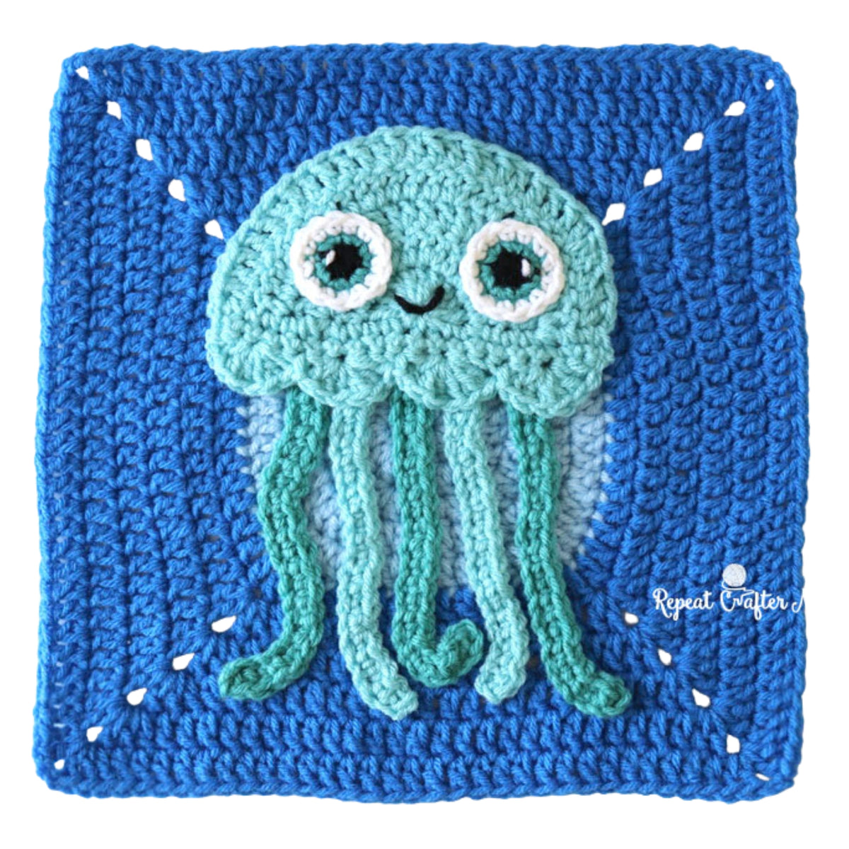 Under The Sea Crochet Blanket made using Red Heart yarn in a styled lifestyle setting