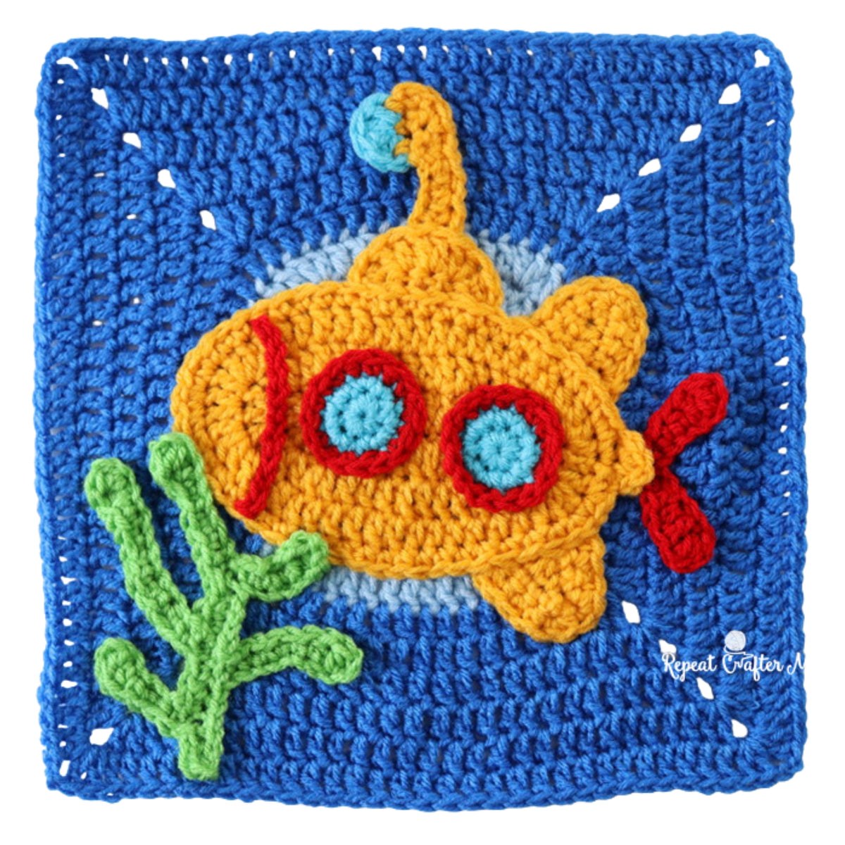 Under The Sea Crochet Blanket made using Red Heart yarn in a styled lifestyle setting