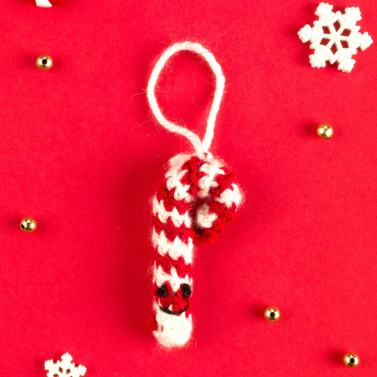 Advent Calendar Crochet Candy Cane made using 2024 yarn