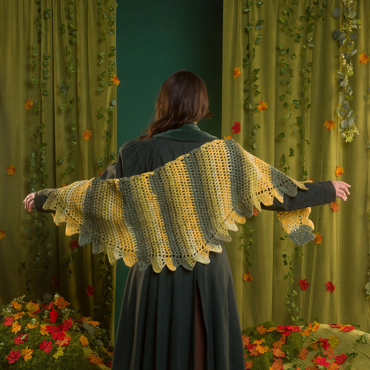 Dragon’S Hoard Crochet Shawl made using Red Heart yarn in a styled lifestyle setting