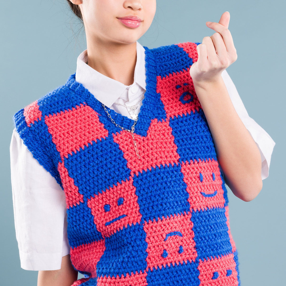 Crochet Checkerboard Mood Sweater Vest made using Red Heart yarn