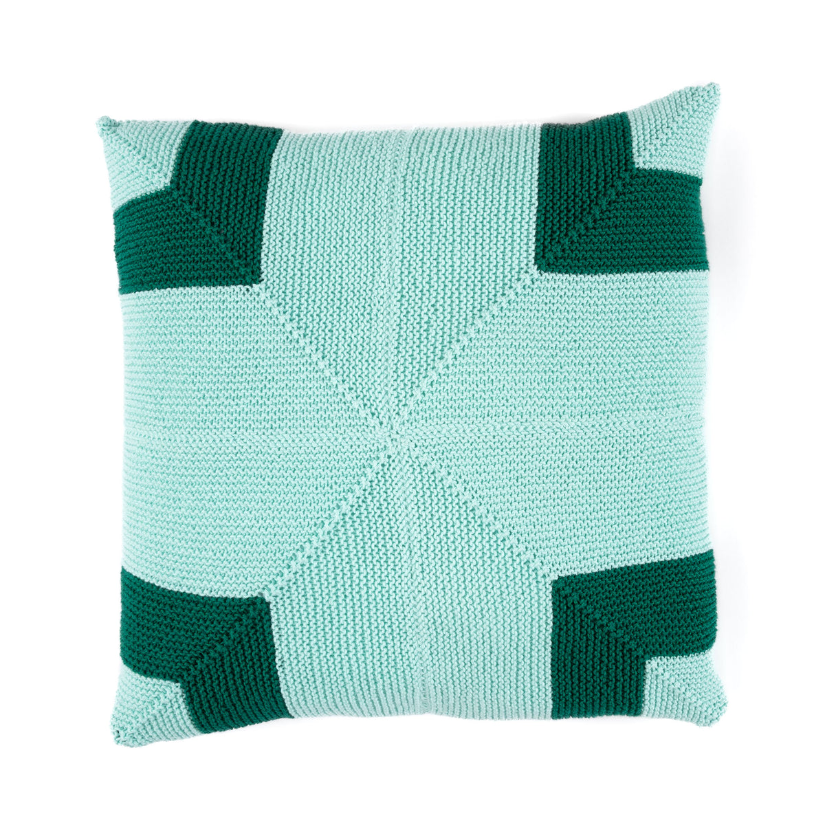 Knitted pillow with a geometric pattern in green and light blue on a white background, Ivy