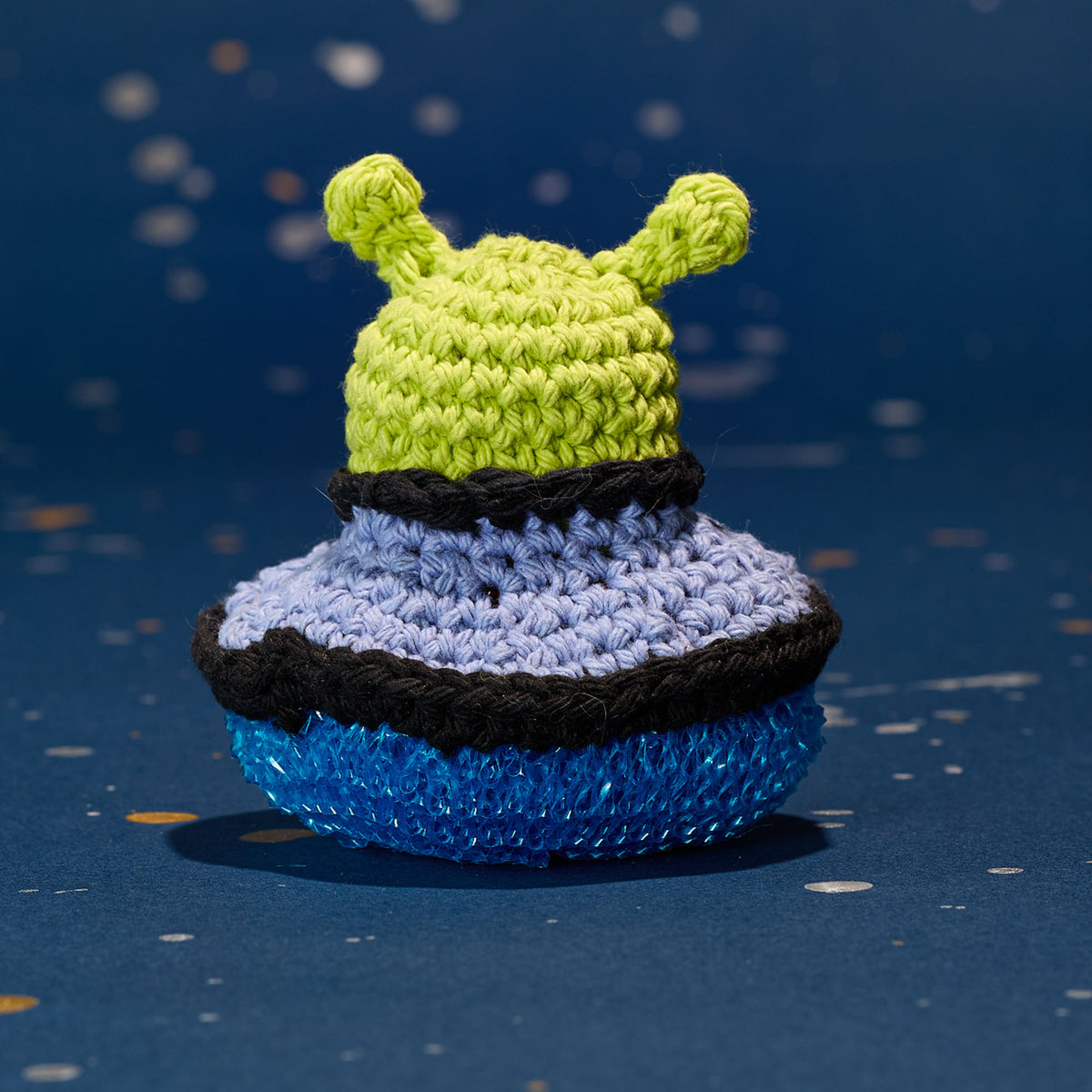 Take Me To Your Cleaner Crochet Scrubber made using Lily yarn in a styled lifestyle setting
