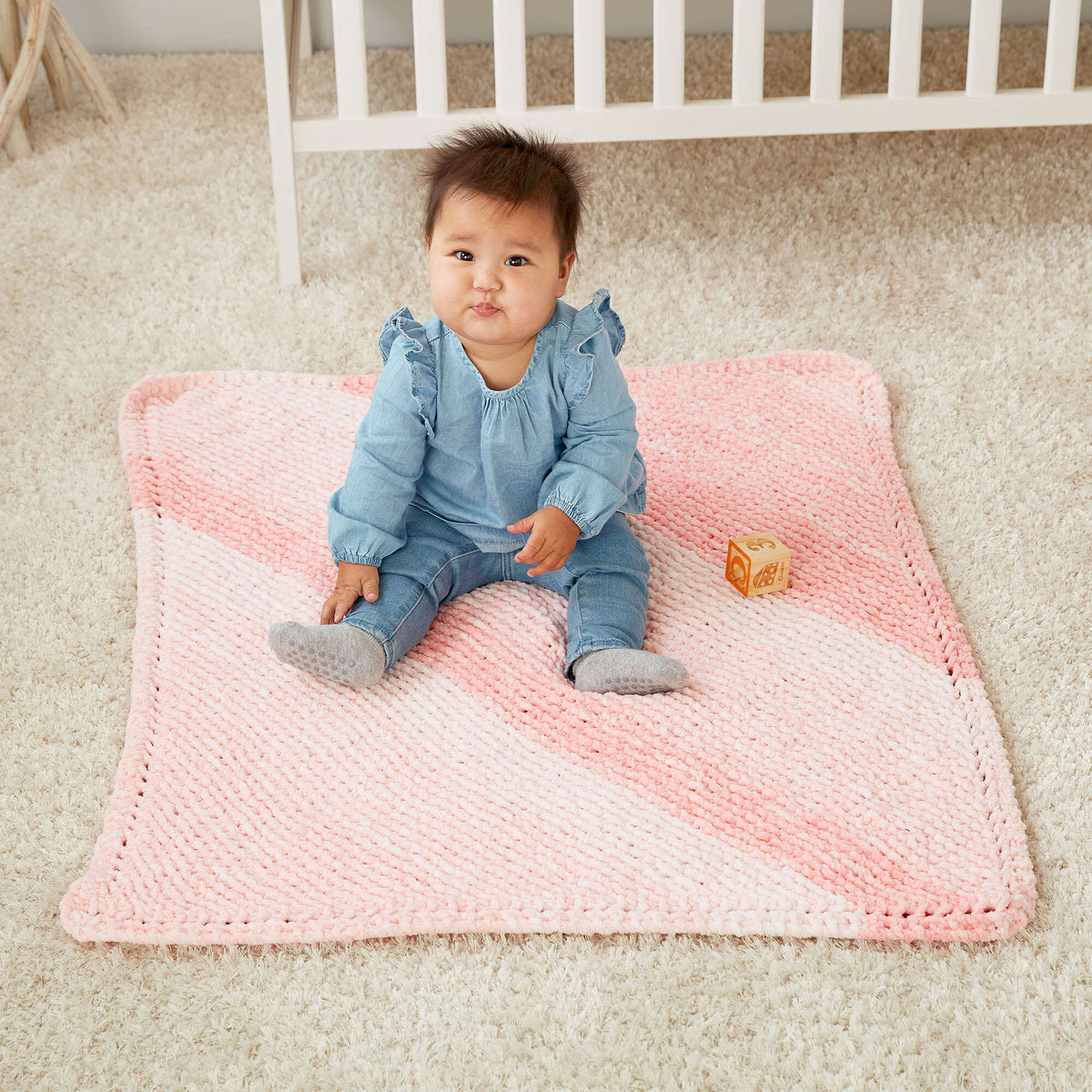 Knit Blanket made in Bernat Baby Blanket yarn