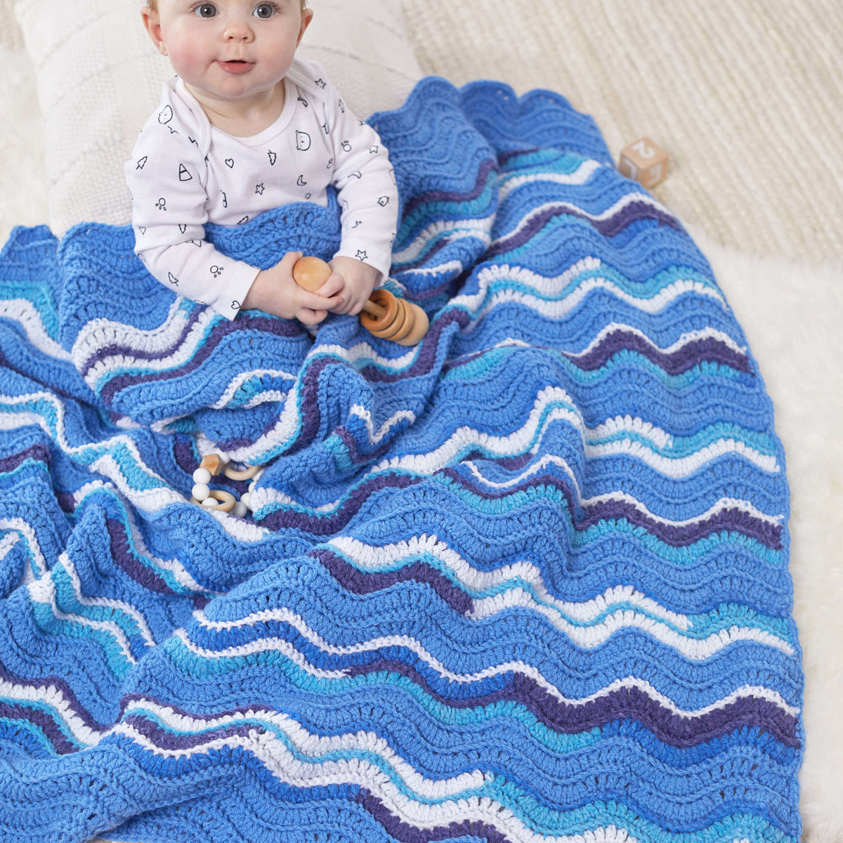 Crochet Blanket made in Red Heart Bunches of Hugs Yarn