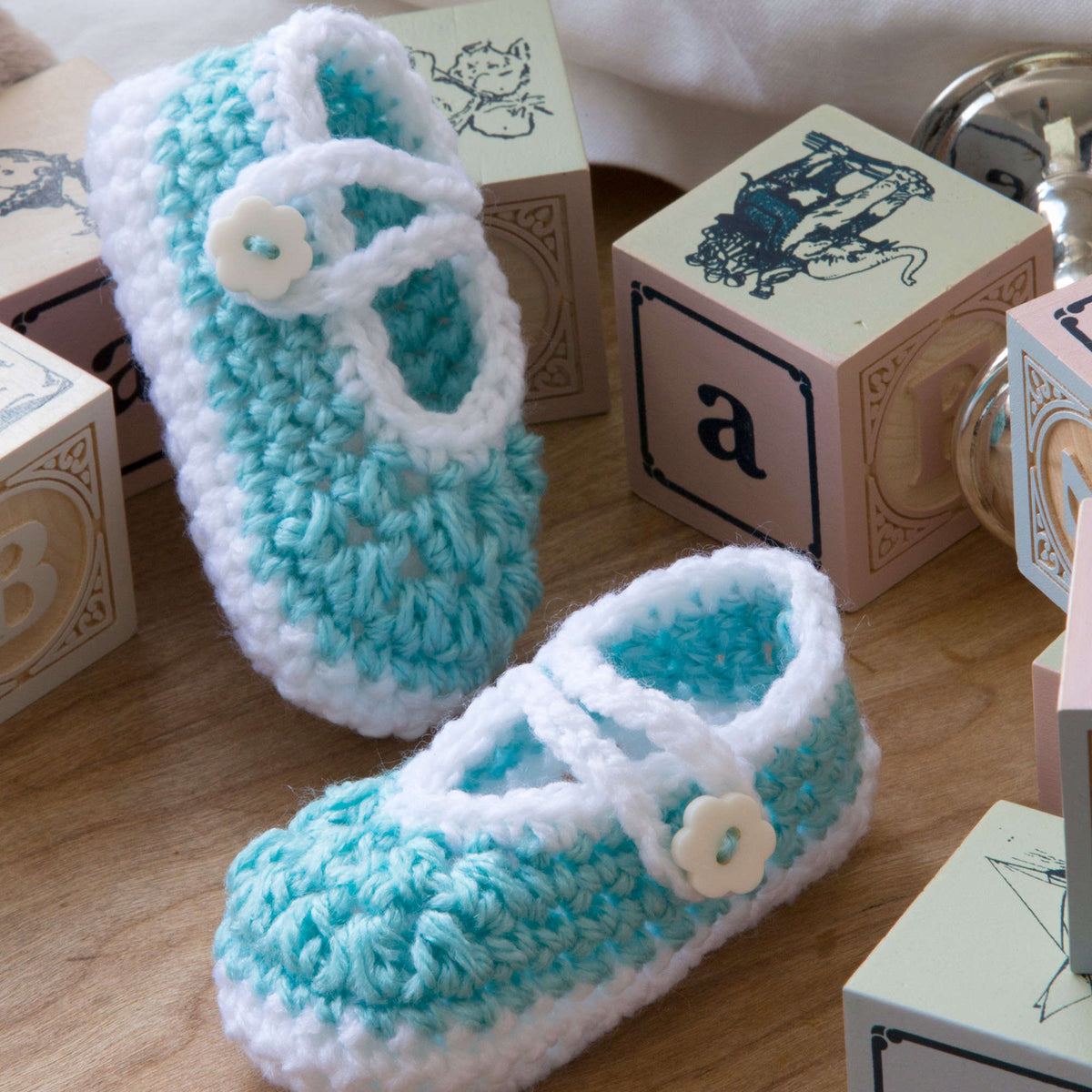 Crochet Booties made in Red Heart Baby Hugs Light Yarn
