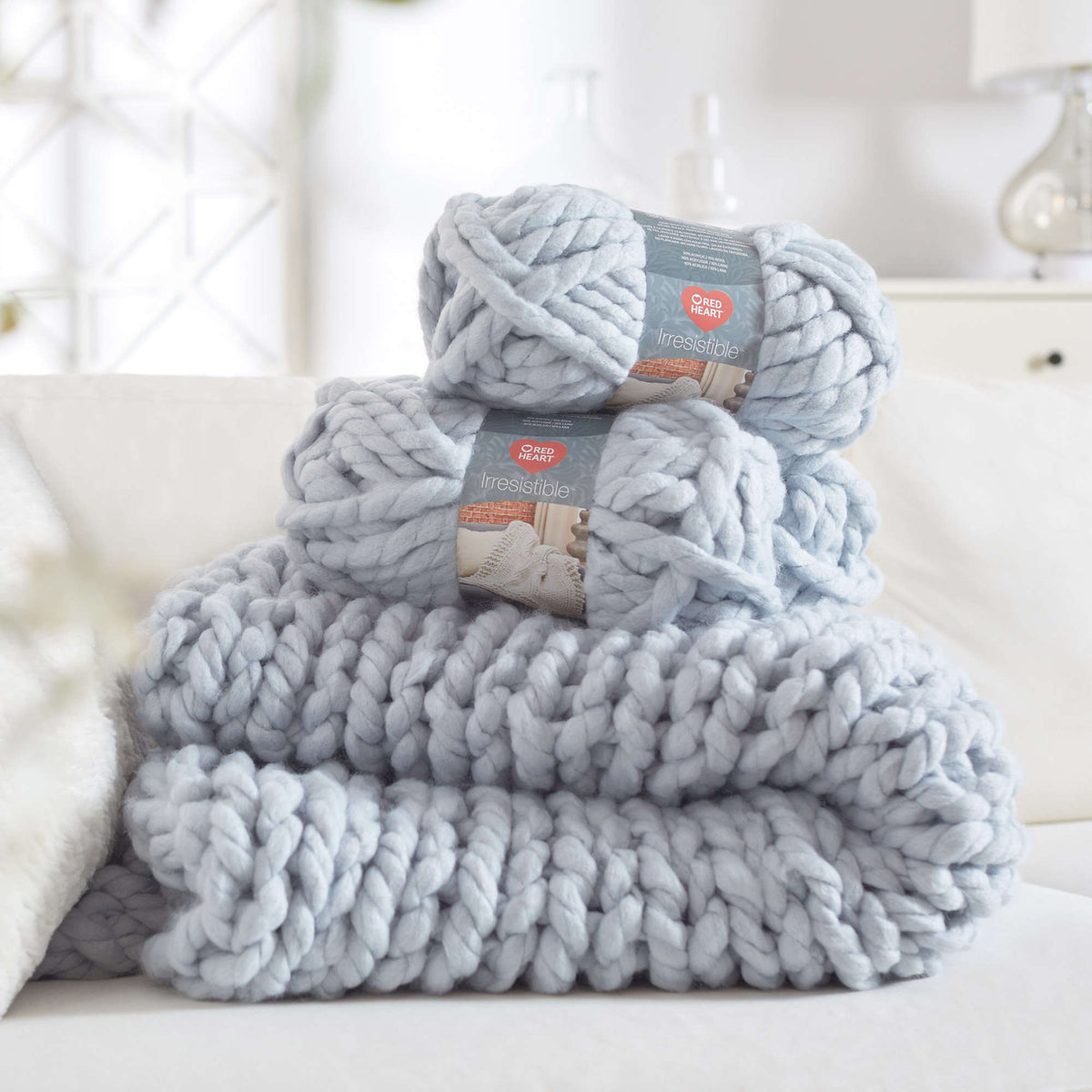 Craft Blanket made in Red Heart Irresistible Yarn