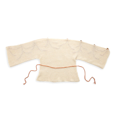 Bernat Crochet Grecian Top Crochet Grecian Top made using Bernat yarn in a styled lifestyle setting