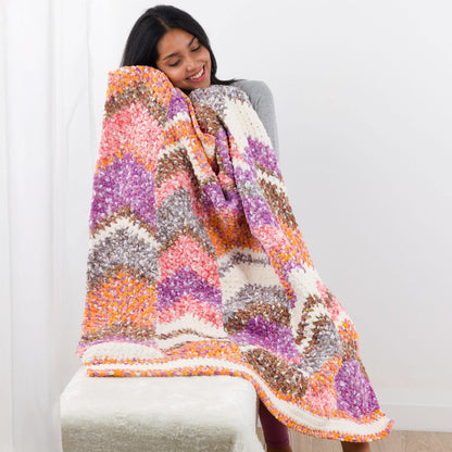 Bernat Moss Stitch Peaks Crochet Toddler Blanket Moss Stitch Peaks Crochet Toddler Blanket made using Bernat yarn