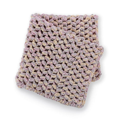 Bernat Puffs a Plenty Crochet Baby Blanket Puffs A Plenty Crochet Baby Blanket made using Bernat yarn in a styled lifestyle setting