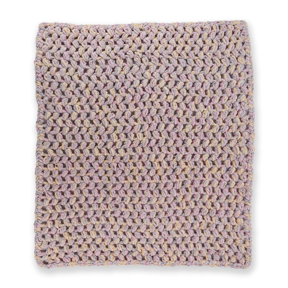 Puffs A Plenty Crochet Baby Blanket made using Bernat yarn on a white background