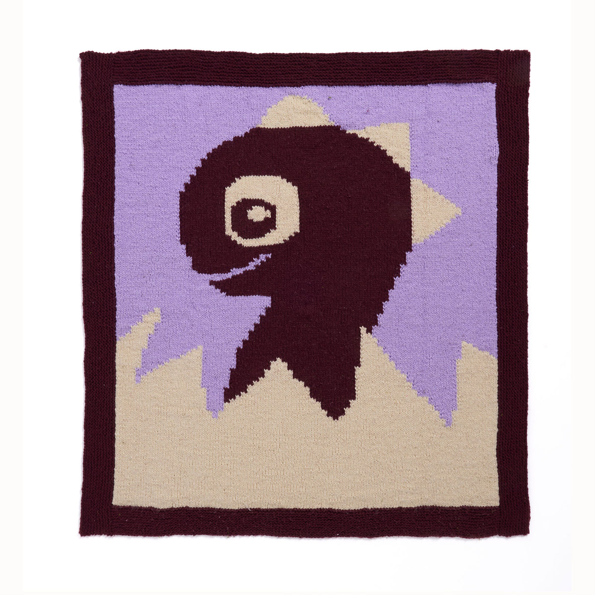 Hatching Dino Knit Blanket made using Bernat yarn