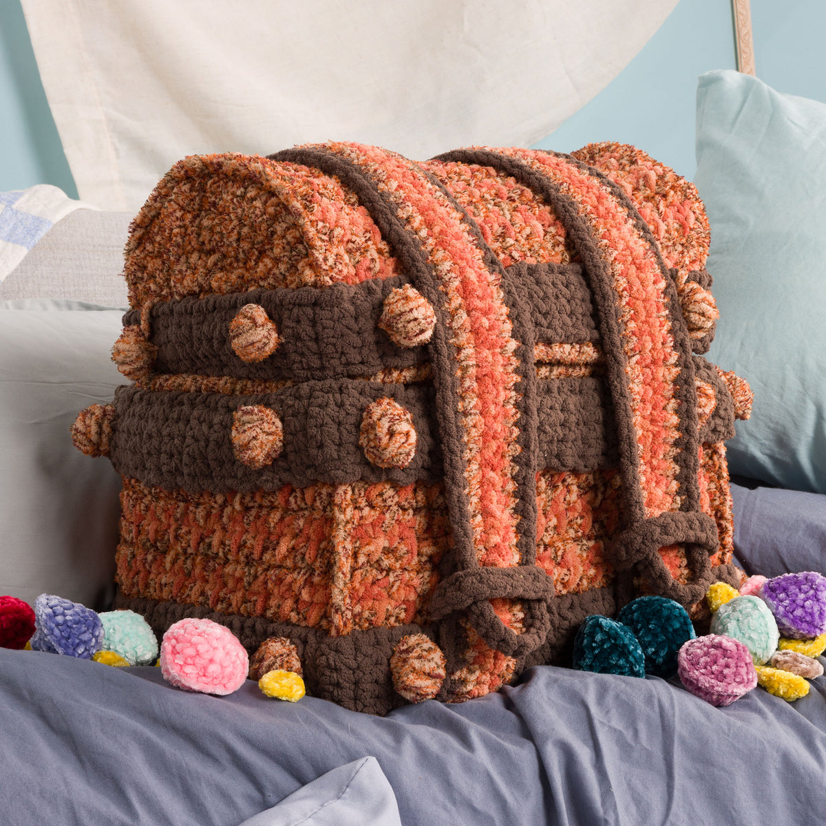 Treasure Crochet Chest Play Set made using Bernat yarn in a styled lifestyle setting