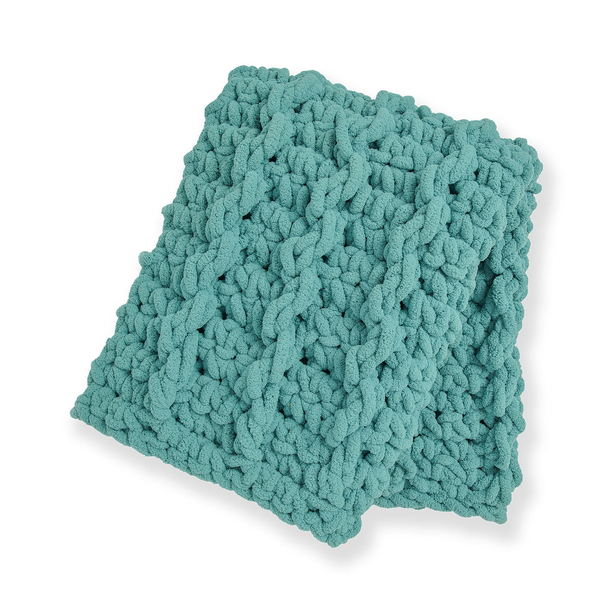 Big Mood Mock Cable Crochet Blanket made using Bernat yarn on a white background