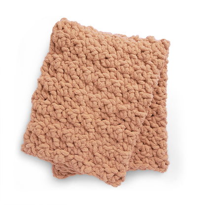 Bernat Big Squeeze Crochet Blanket Big Squeeze Crochet Blanket made using Bernat yarn on a white background