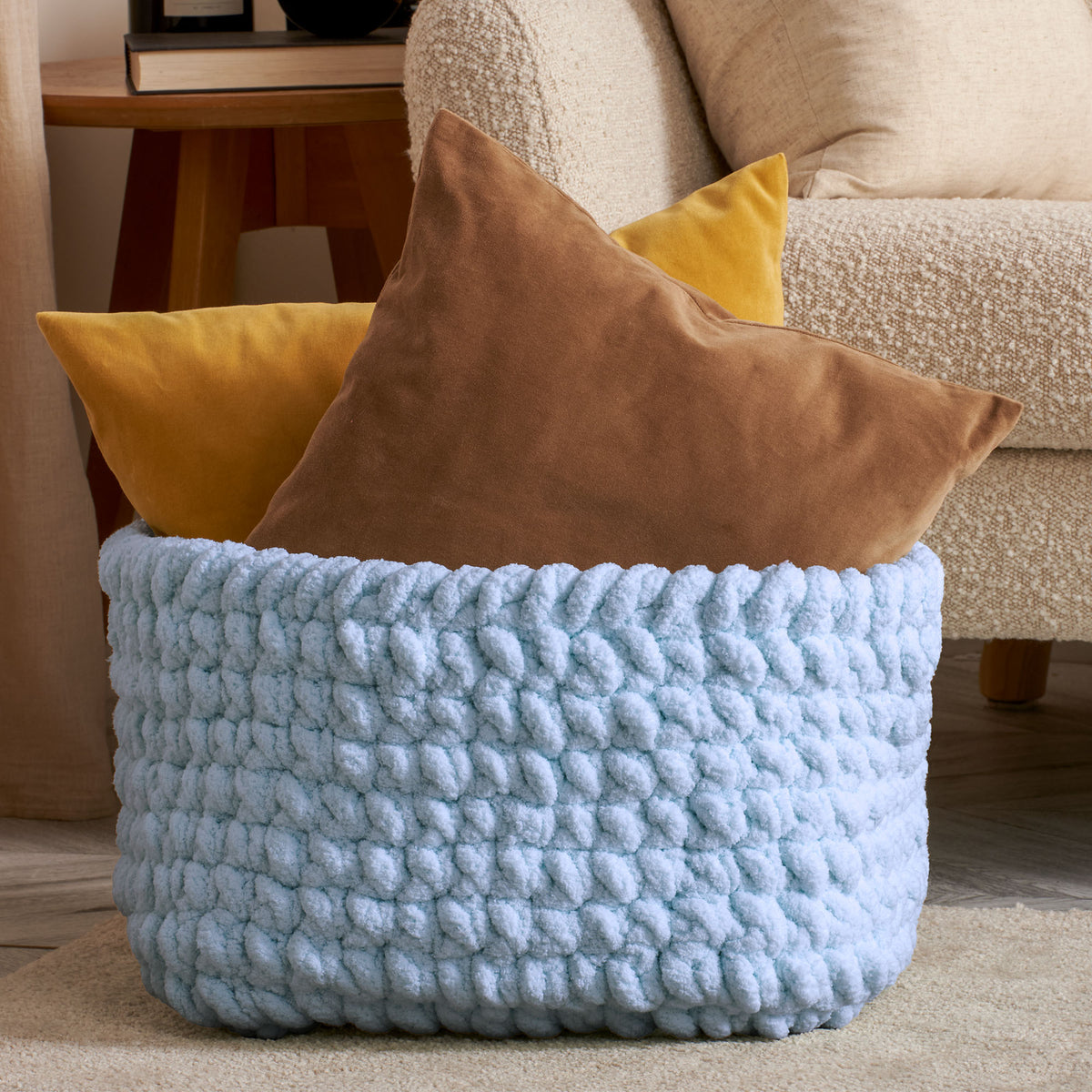 Squishy Square Crochet Basket made using Bernat yarn in a styled lifestyle setting