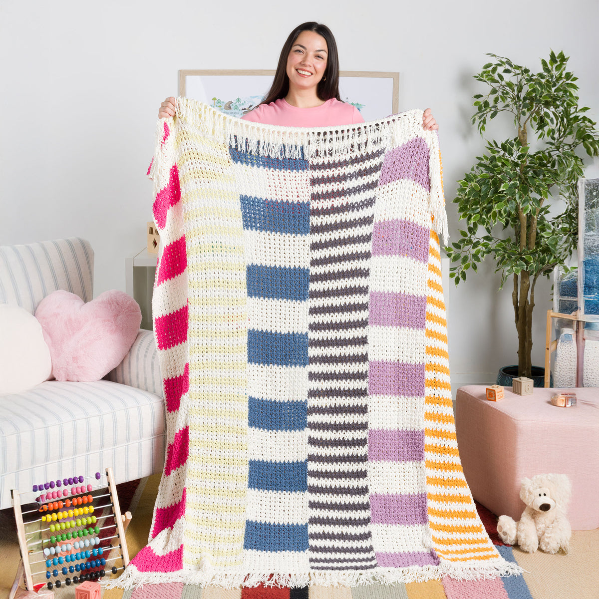 Cozy Colors Crochet Beach Blanket made using Bernat yarn