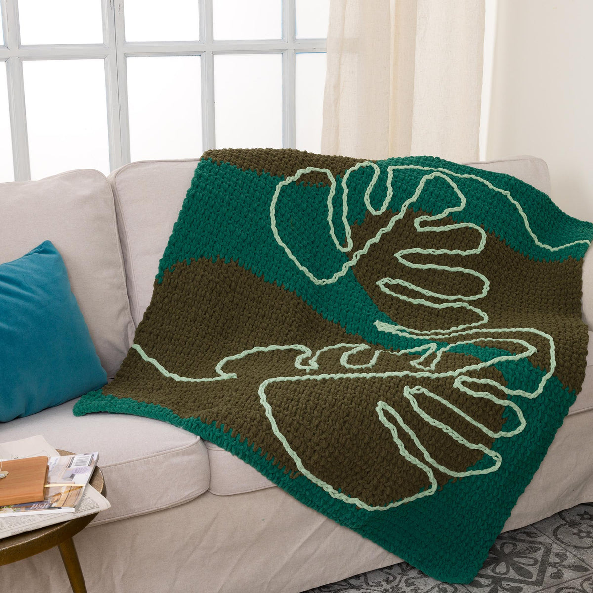 Crochet Modern Monstera Blanket made using Bernat yarn