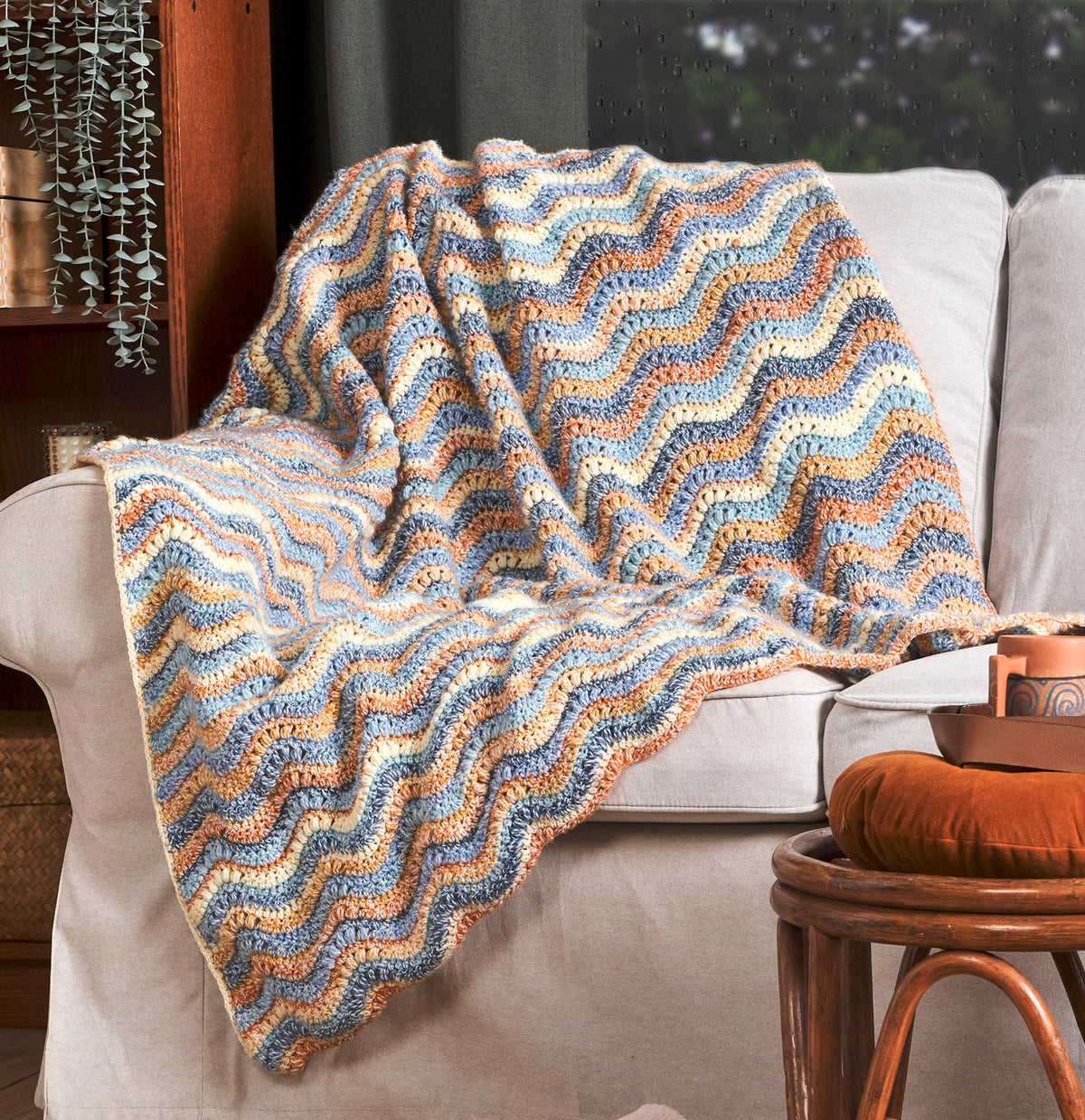Rippled Puff Stitch Crochet Blanket made using Bernat yarn