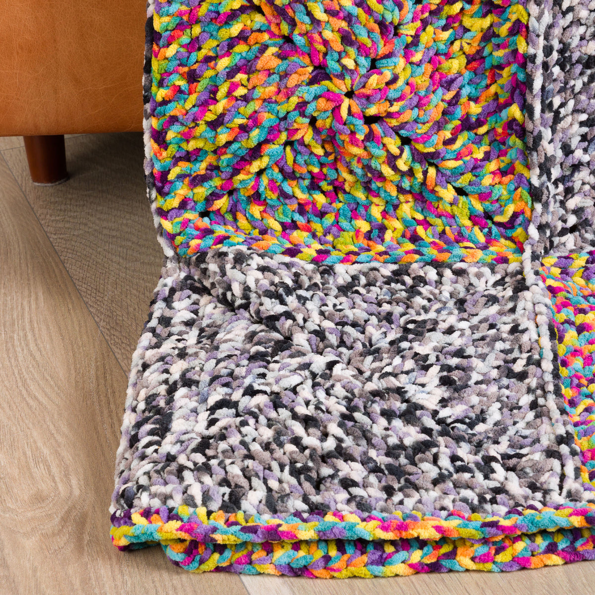 Vivid & Void Crochet Blanket made using Bernat yarn