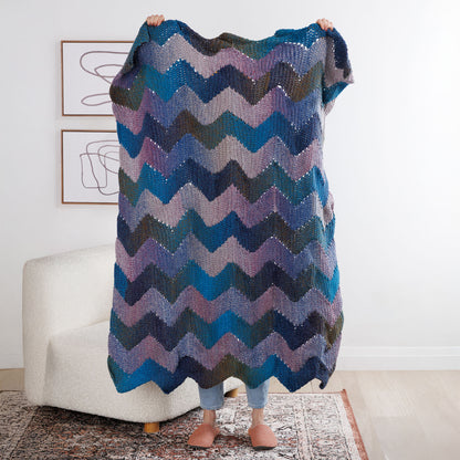 Bernat Join As You Zig Zag Crochet Blanket Join As You Zig Zag Crochet Blanket made using Bernat yarn in a styled lifestyle setting