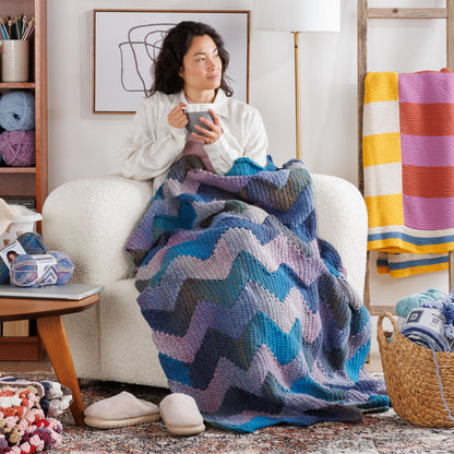 Bernat Join As You Zig Zag Crochet Blanket Join As You Zig Zag Crochet Blanket made using Bernat yarn in a styled lifestyle setting