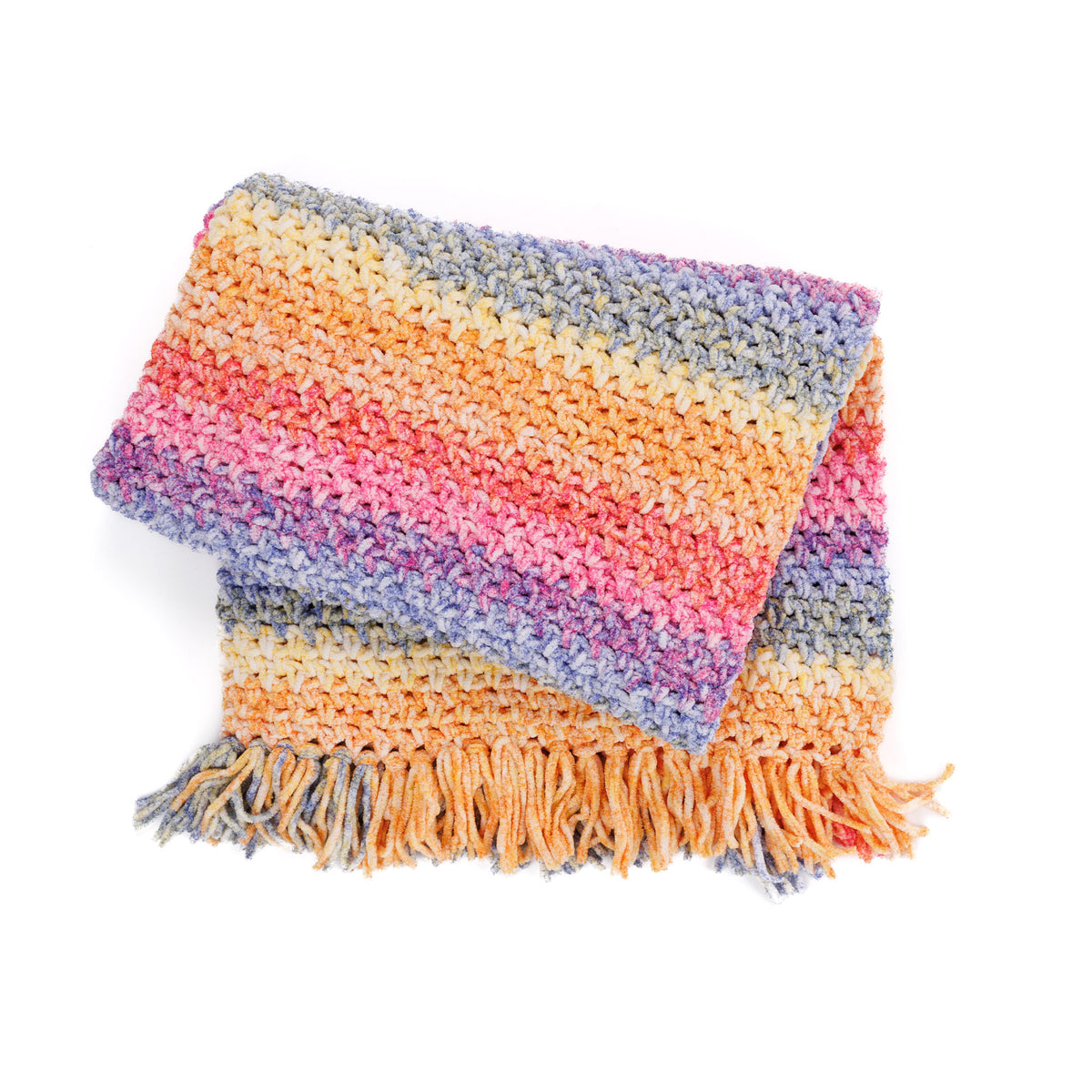 Morning Moss-Stitch Crochet Blanket made using Bernat yarn in a styled lifestyle setting
