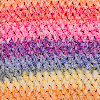 Bernat Morning Moss-Stitch Crochet Blanket Morning Moss-Stitch Crochet Blanket made using Bernat yarn in a styled lifestyle setting