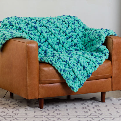 Bernat Ridged Big Crochet Blanket Ridged Big Crochet Blanket made using Bernat yarn in a styled lifestyle setting
