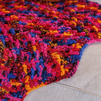 Bernat Candy Crochet Chevron Blanket Candy Crochet Chevron Blanket made using Bernat yarn in a styled lifestyle setting