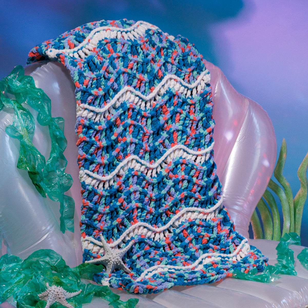 Rippling Reef Crochet Blanket made using Bernat yarn