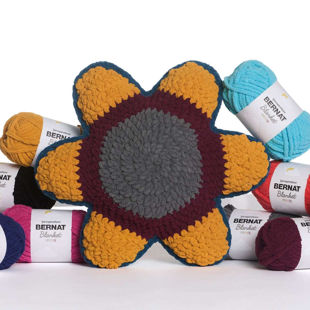 Bloomin’ Comfort Crochet Petal Pillow made using Bernat yarn