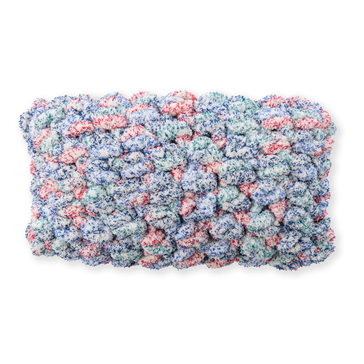 Quick Crochet Lumbar Pillow made using Bernat yarn in a styled lifestyle setting