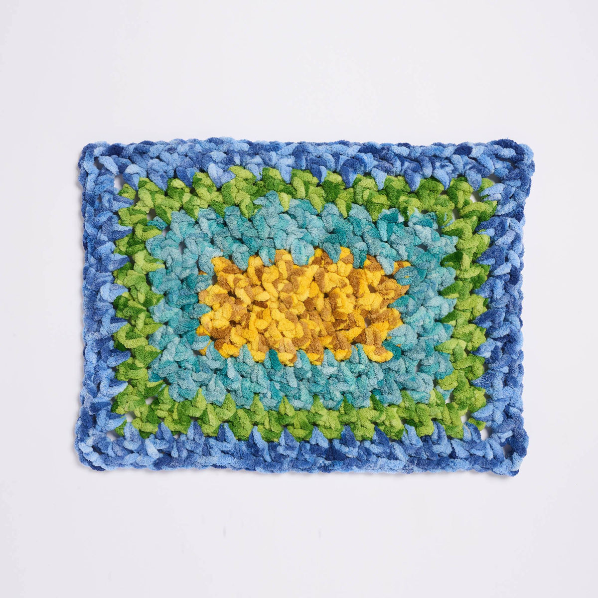 ‘Round The Middle Crochet Rug made using Bernat yarn