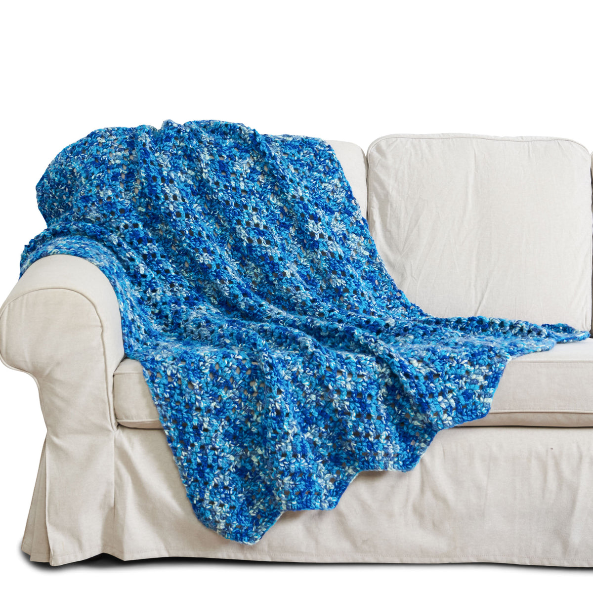 Spark Cozy Crochet Ripple Blanket made using Bernat yarn