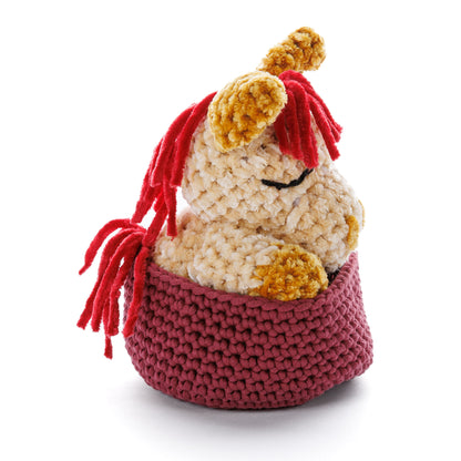 Bernat Sleeping Foal to Crochet Sleeping Foal To Crochet made using Bernat yarn in a styled lifestyle setting