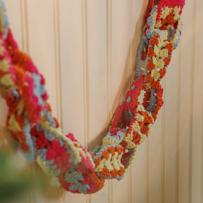 Bernat Crochet Granny Chain Garland Crochet Granny Chain Garland made using Bernat yarn in a styled lifestyle setting