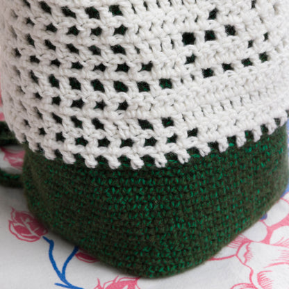 Bernat Crochet Filet Fern Backpack Crochet Filet Fern Backpack made using Bernat yarn