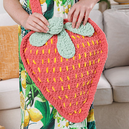 Bernat Plush Berry Crochet Bag Plush Berry Crochet Bag made using Bernat yarn in a styled lifestyle setting