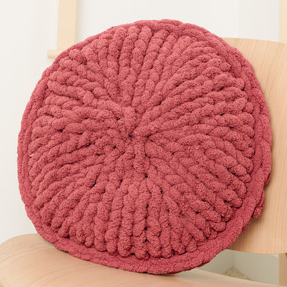 Bernat Roundabout Table Knit Pillow Roundabout Table Knit Pillow made using Bernat yarn in a styled lifestyle setting
