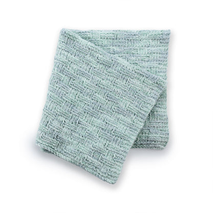 Bernat Knit & Weave Baby Blanket Knit & Weave Baby Blanket made using Bernat yarn in a styled lifestyle setting