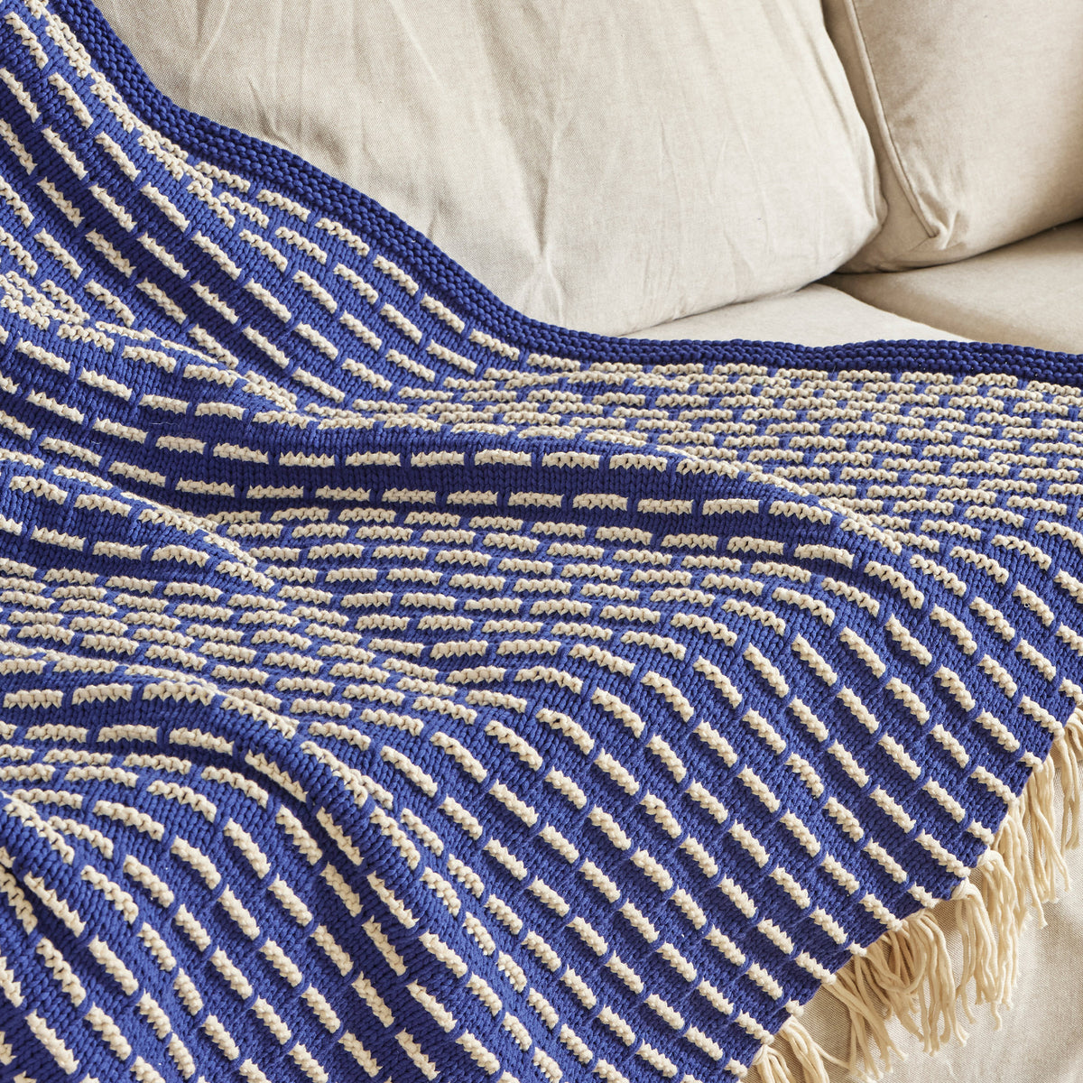 Knit Modern Weave Blanket made using Bernat yarn