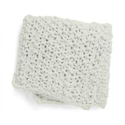 Bernat Cozy Does It Seed Stitch Knit Blanket Cozy Does It Seed Stitch Knit Blanket made using Bernat yarn on a white background