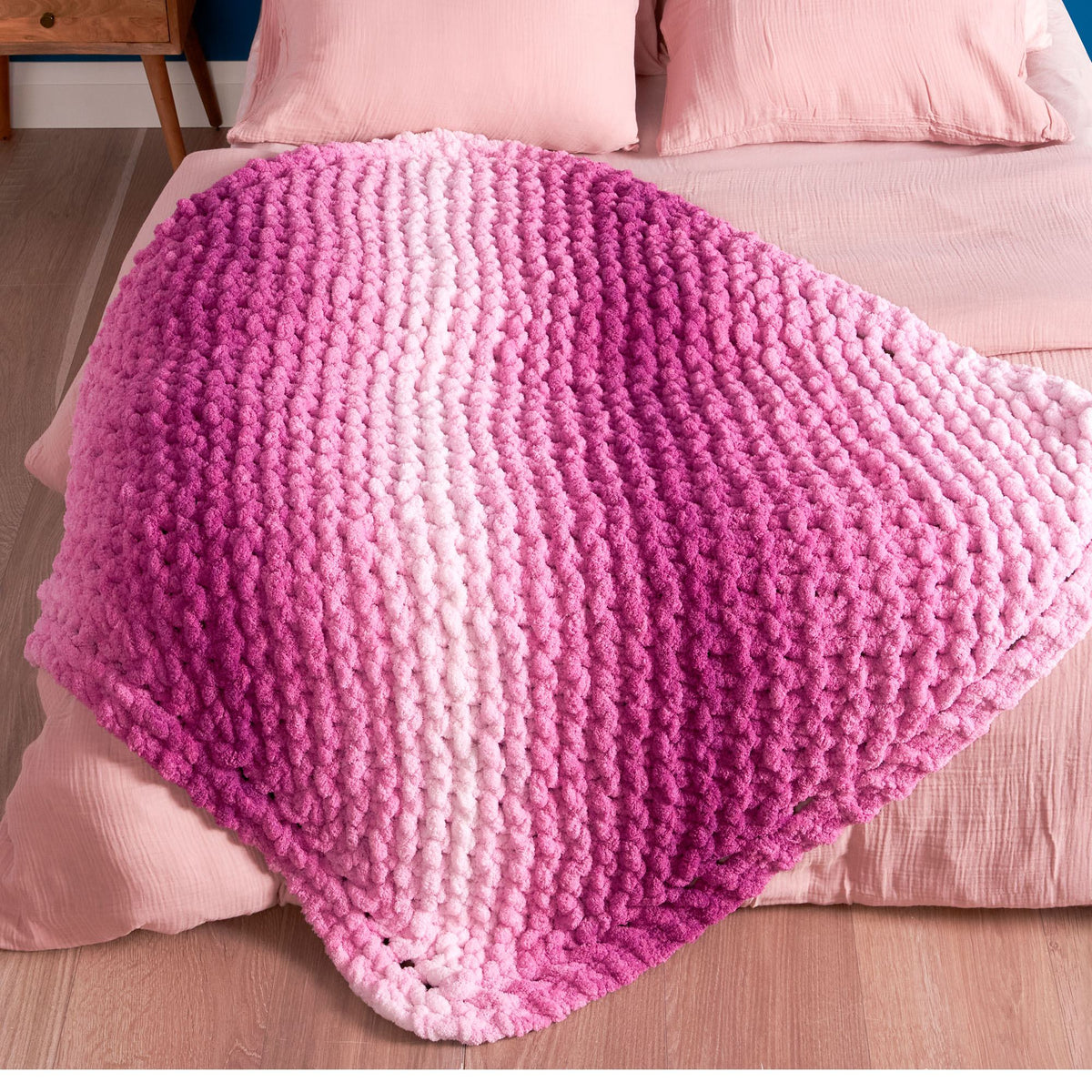 Knit On The Bias Blanket made using Bernat yarn