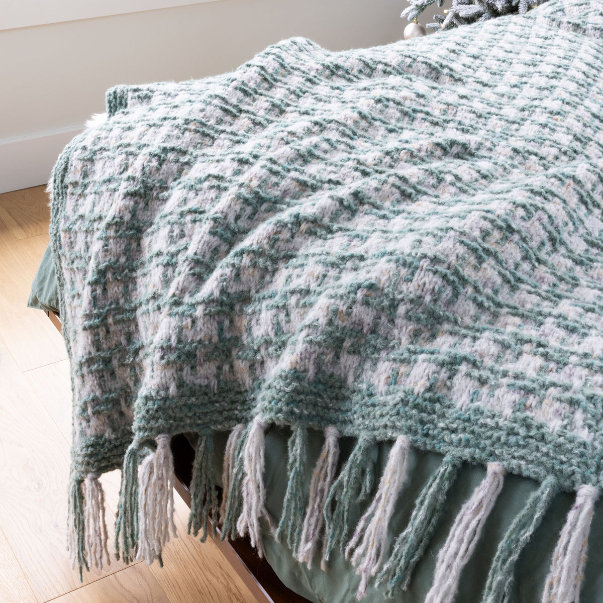 Lofty Houndstooth Knit Blanket made using Bernat yarn