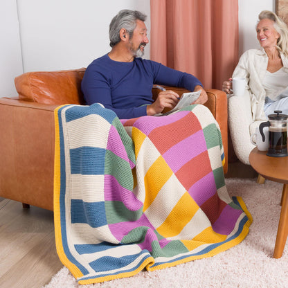 Bernat Harmonious Stripes Garter Knit Blanket Harmonious Stripes Garter Knit Blanket made using Bernat yarn