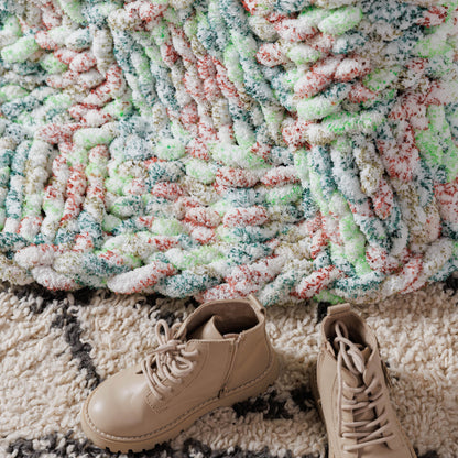 Bernat Bold Knit Textured Check Blanket Bold Knit Textured Check Blanket made using Bernat yarn