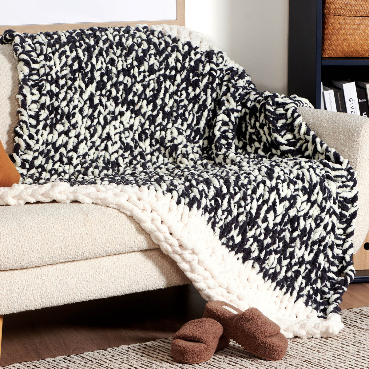 Go With The Flow Table Knit Blanket made using Bernat yarn